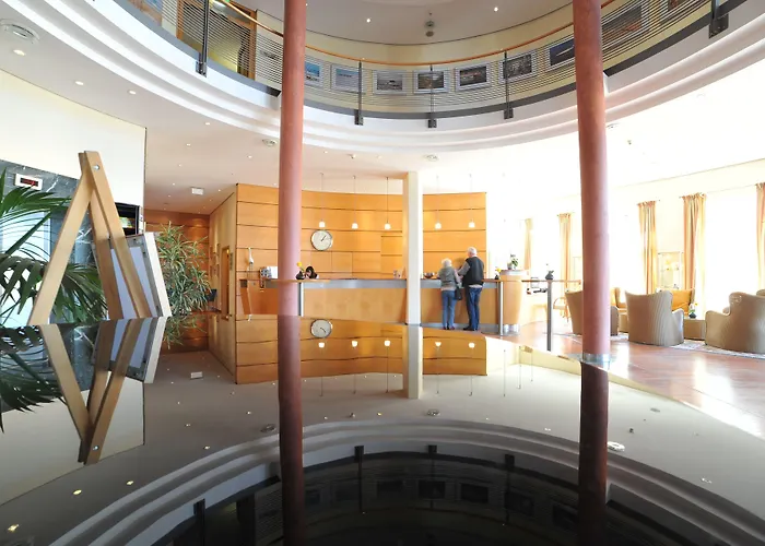 Отель Strand-hotel Huebner